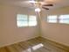 Large bedroom with wood-look floors and ceiling fan at 8655 Sw 98Th Street Rd # A, Ocala, FL 34481