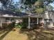 One-story house with carport and mature landscaping at 8655 Sw 98Th Street Rd # A, Ocala, FL 34481