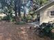 Landscaped side yard with a patio area at 8655 Sw 98Th Street Rd # A, Ocala, FL 34481