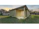 Small back patio with sliding glass doors at 1029 Lakewood Ct, Lakeland, FL 33801