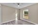 Bedroom with ceiling fan and large window at 1029 Lakewood Ct, Lakeland, FL 33801