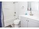 Clean bathroom with tub, toilet and vanity at 1074 Berkeley Dr, Kissimmee, FL 34744
