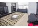 Spacious bedroom with a king-size bed and ample storage at 1074 Berkeley Dr, Kissimmee, FL 34744