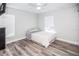 Cozy bedroom with a double bed and window at 1074 Berkeley Dr, Kissimmee, FL 34744