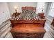 Main bedroom with wood floors, large bed, and ample storage at 1074 Berkeley Dr, Kissimmee, FL 34744
