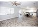 Open concept dining area with kitchen and access to the patio at 1074 Berkeley Dr, Kissimmee, FL 34744