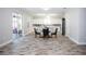 Open concept dining area with kitchen and patio access at 1074 Berkeley Dr, Kissimmee, FL 34744