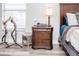Nightstand with lamp, and decorative horns at 1074 Berkeley Dr, Kissimmee, FL 34744