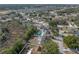 Aerial view showcasing house and pool at 140 Bentley Oaks Blvd, Davenport, FL 33896