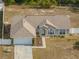 Single-story house with attached garage at 140 Bentley Oaks Blvd, Davenport, FL 33896