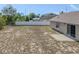 Backyard with patio and fenced enclosure at 140 Bentley Oaks Blvd, Davenport, FL 33896