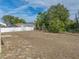 Large backyard with fenced enclosure at 140 Bentley Oaks Blvd, Davenport, FL 33896