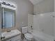 Clean bathroom with a shower/tub combo and updated vanity at 140 Bentley Oaks Blvd, Davenport, FL 33896