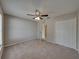 Spacious bedroom with carpet flooring and ample closet space at 140 Bentley Oaks Blvd, Davenport, FL 33896