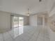 Spacious dining area with sliding glass doors leading to the backyard at 140 Bentley Oaks Blvd, Davenport, FL 33896