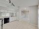 Kitchen with stainless steel appliances and view to dining area at 140 Bentley Oaks Blvd, Davenport, FL 33896