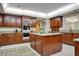 Well-equipped kitchen with island, ample storage, and granite countertops at 1419 Hollingsworth Oaks Dr, Lakeland, FL 33803