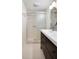 Updated bathroom with double vanity and hexagon tile at 1632 Tangerine St, Lakeland, FL 33803