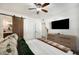 Spacious bedroom with a large TV and dresser at 1632 Tangerine St, Lakeland, FL 33803