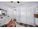 Bedroom with a dresser, closet, and view of hallway at 1632 Tangerine St, Lakeland, FL 33803