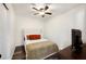Cozy bedroom with TV and ceiling fan at 1632 Tangerine St, Lakeland, FL 33803