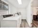 White washer and dryer in a bright laundry room at 1632 Tangerine St, Lakeland, FL 33803