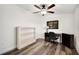 Small home office with desk, chair, and built-in shelving at 1632 Tangerine St, Lakeland, FL 33803
