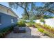 Spacious brick patio with seating area and lush landscaping at 1632 Tangerine St, Lakeland, FL 33803
