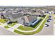 Aerial view of a house with an appealing landscaped yard and a private fenced backyard at 1878 Pristine Loop, Lakeland, FL 33811