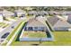 Aerial view of a cozy house featuring a well-maintained, fenced backyard at 1878 Pristine Loop, Lakeland, FL 33811