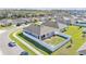 Aerial view of a cozy house featuring a well-maintained, fenced backyard at 1878 Pristine Loop, Lakeland, FL 33811