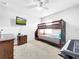 Bedroom with bunk bed and carpeted floors at 1878 Pristine Loop, Lakeland, FL 33811