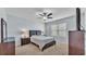 Bedroom features a large window, comfortable bed, and neutral colors at 1878 Pristine Loop, Lakeland, FL 33811