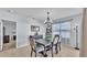 Elegant dining room with modern chandelier and comfortable seating at 1878 Pristine Loop, Lakeland, FL 33811