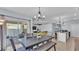 Open dining area with sliding glass doors leading to the outdoor patio at 1878 Pristine Loop, Lakeland, FL 33811