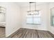 Bright dining area with hardwood floors and large window at 1936 Deep Creek Dr, Lakeland, FL 33810