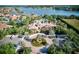 Resort-style community pool, clubhouse, and playground with lake views at 1958 Altavista Cir, Lakeland, FL 33810