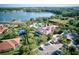 Community pool, clubhouse, playground and lakefront at 1958 Altavista Cir, Lakeland, FL 33810