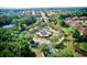 Aerial view of community entrance with circular fountain and landscaping at 1958 Altavista Cir, Lakeland, FL 33810