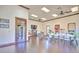 Community room with tables, chairs, and a fireplace at 1958 Altavista Cir, Lakeland, FL 33810
