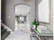Elegant entryway with marble floors and a view to the dining area at 1958 Altavista Cir, Lakeland, FL 33810