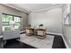 Home office features a large desk, gray chair, and textured wallpaper at 1958 Altavista Cir, Lakeland, FL 33810