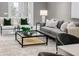 Comfortable living room with gray sofas and a stylish coffee table at 1958 Altavista Cir, Lakeland, FL 33810