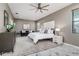 Spacious main bedroom with a comfortable bed and sitting area at 1958 Altavista Cir, Lakeland, FL 33810