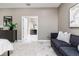 Main bedroom with sitting area and en-suite bathroom access at 1958 Altavista Cir, Lakeland, FL 33810
