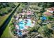 Community pool with a clubhouse and playground at 1958 Altavista Cir, Lakeland, FL 33810