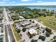 Aerial view showing property near restaurants and a lake at 2348 Isle Royale Se Ct, Winter Haven, FL 33880