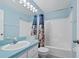 Clean bathroom with tub and shower combination at 2348 Isle Royale Se Ct, Winter Haven, FL 33880