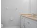 Simple bathroom with light beige vanity and white fixtures at 2348 Isle Royale Se Ct, Winter Haven, FL 33880