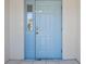Light-blue front door with a keypad at 2348 Isle Royale Se Ct, Winter Haven, FL 33880